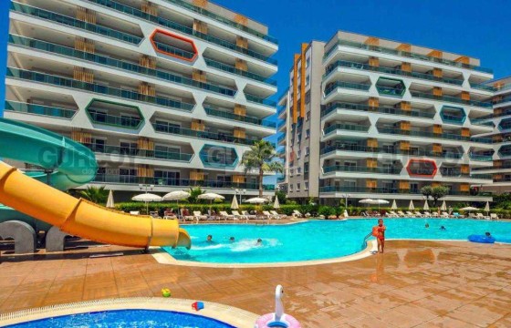 Апартаменты 1+1 в престижной резиденции, 55 кв.м. в Авсалларе. в Турции - фото 12
