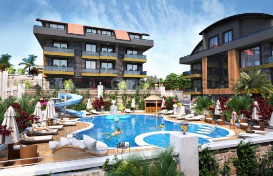 Премиальный  проект в районе Хасбахче. Пентхаусы и садовые дублексы. 2+1 и 3+1 (115м2- 210м2) в Турции - фото 1