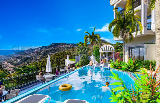 Новый современный проект на склоне гор с шикарным видом на море и горы в Турции - фото 3