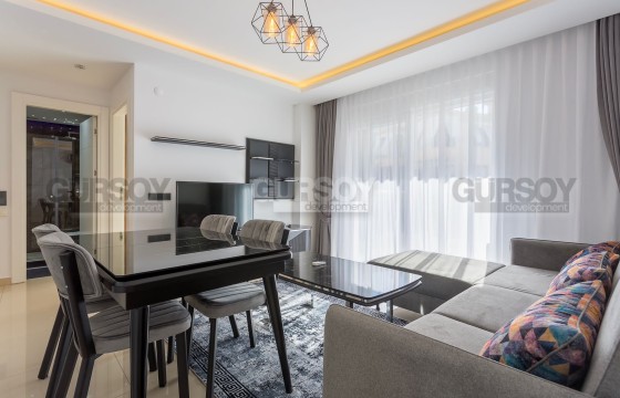 Квартира 1+1 в престижном комплексе, 55 м2 в центре Алании. в Турции - фото 2