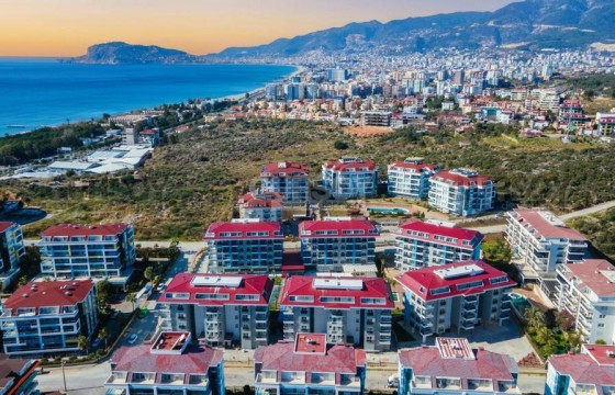 Новая просторная квартира 1+1 в шикарном жилом комплексе всего в 200 м от моря в Кестеле, 65 м2 в Турции - фото 1