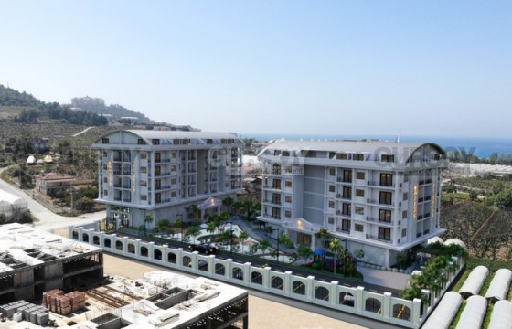 Квартиры разных планировок от 60 кв.м. в новом комплексе у моря в Каргыджаке. в Турции - фото 3