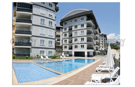 Стильная меблированная квартира 2+1 в современном комплексе в Джикджилли, 100 м2 в Турции - фото 2