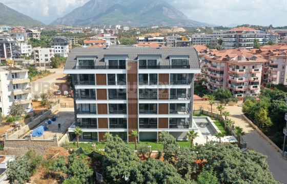 Меблированные апартаменты 1+1 в новом комплексе в Оба, 55 м2 в Турции - фото 5