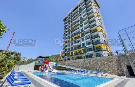 Стильная меблированная квартира 2+1 с видом на море в элитном комплексе в Махмутларе, 95 м2 в Турции - фото 7