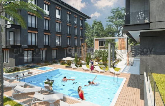 Небольшой современный жилой комплекс в районе Бейликдюзю, 128м2-261м2 в Турции - фото 5