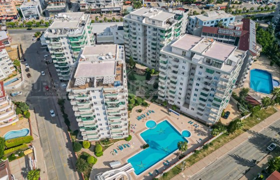 Просторная меблированная квартира 2+1 в элитном комплексе всего в 200 м от моря в Тосмуре, 125 м2 в Турции - фото 8