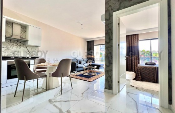 Уютная квартира 1+1 с видом на море в районе Каргыджак, 61 м2. в Турции - фото 6