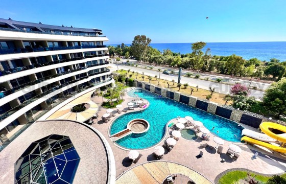 Квартира 1+1 премиум класса на первой береговой линии в Каргыджаке, 55 м2. в Турции - фото 11