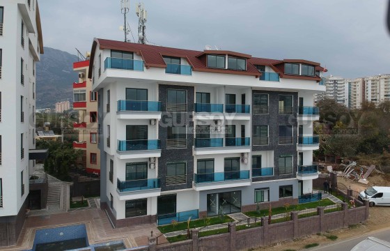 Квартиры 1+1 и 4+1 в уютном современном комплексе в Махмутларе, 55-245 м2 в Турции - фото 11