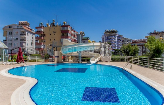 Три стильные просторные квартиры 2+1 в Джикджилли с видом на море и Крепость, 120 м2 в Турции - фото 1