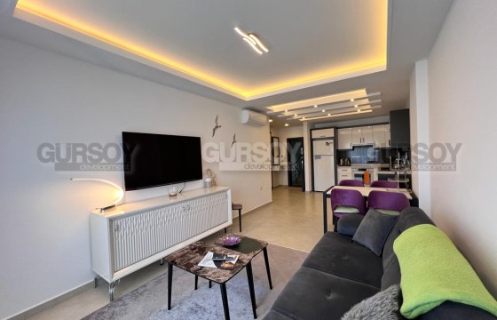 Уютная меблированная квартира 1+1 в районе Авсаллар, 65м2 в Турции - фото 8