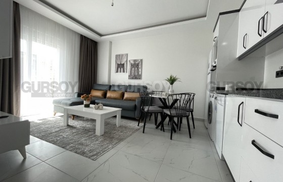 Новая двухкомнатная квартира в 300 метрах от моря в Каргыджаке, 50 м2. в Турции - фото 10