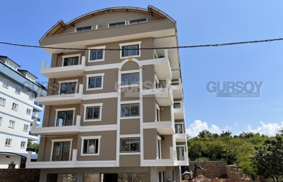 Квартира 1+1, общей площадью 55 м2 в новом комплексе в районе Оба г. Алания в Турции - фото 3