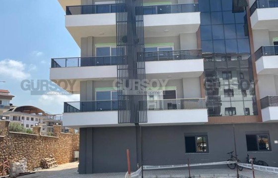 Новая квартира 1+1 с видом на горы в современном ЖК в районе Оба, 55 м2 в Турции - фото 9