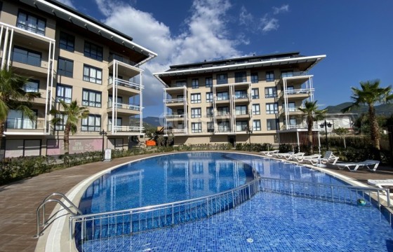 Стильная квартира 1+1 с восхитительным видом на горы в районе Оба, 60 м2 в Турции - фото 3