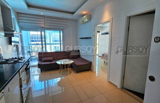 Меблированная квартира 1+1 в уютном ЖК всего в 200 м от пляжа Клеопатры, 50 м2 в Турции - фото 10