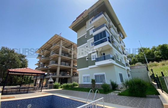 Двухкомнатная квартира 50 кв.м. в районе верхняя Оба. в Турции - фото 1