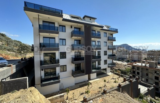 Новая квартира 1+1 с шикарными видами всего в 500 метрах от пляжа Клеопатры, 60 м2 в Турции - фото 1