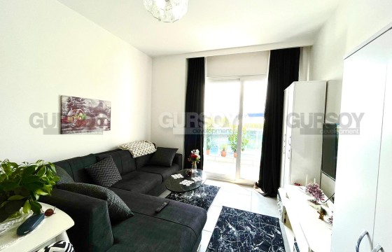 Комфортабельная, уютная квартира 1+1, в ухоженном жилом комплексе, в районе Махмутлар в Турции - фото 2