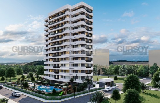 Квартиры в жилом комплексе на этапе строительства в 300 метрах от моря, в курортном районе Мерсина - Эрдемли в Турции - фото 6