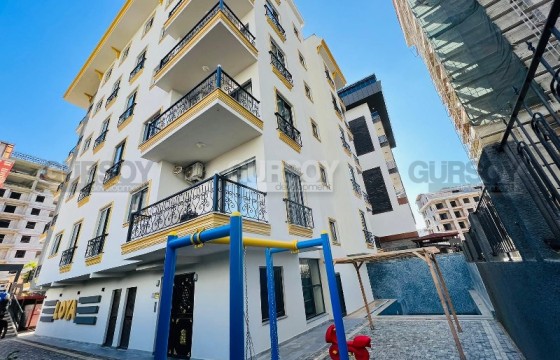 Новая квартира 1+1 на втором этаже в центре района Махмутлар, общая площадь 60м2 в Турции - фото 7