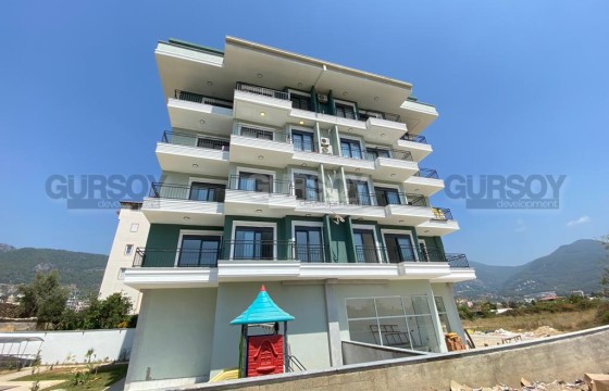 Новая квартира с видом на горы, на 2-м этаже в новой резиденции, в перспективном районе Аланьи - Чиплаклы в Турции - фото 3