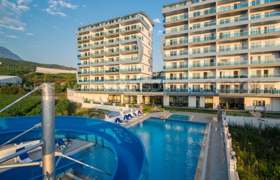 Панорамная двухуровневая квартира с видом на море и гору Кале, в новом жилом комплексе, инфраструктурой «город в городе» в Турции - фото 9