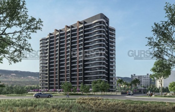 Апартаменты в 15-этажном жилом комплексе на начальной стадии строительства, в 300 метрах от моря, в популярном районе Мерсина - Томюк в Турции - фото 1