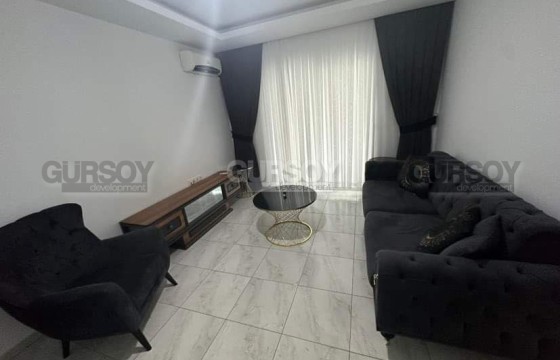 Квартира 1+1, общей площадью 65 м2, в 800 метрах от моря, в популярном районе Аланьи - Махмутлар в Турции - фото 3