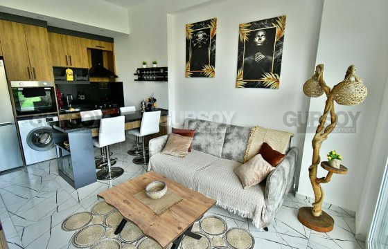 Стильная квартира с панорамным видом на горы, на 3-м этаже, в новом жилом комплексе с богатейшей внутренней инфраструктурой в Турции - фото 1