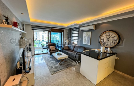 Стильная квартира с современным дизайном, в благоустроенном жилом комплексе, в 750 метрах от моря в Турции - фото 11