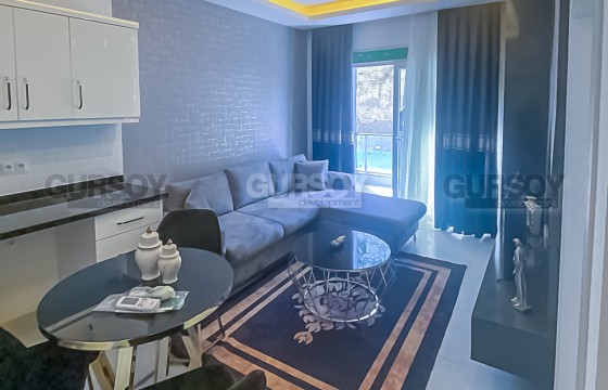 Компактная квартира с новой мебелью и бытовой техникой в километре от моря, в районе Авсаллар в Турции - фото 4