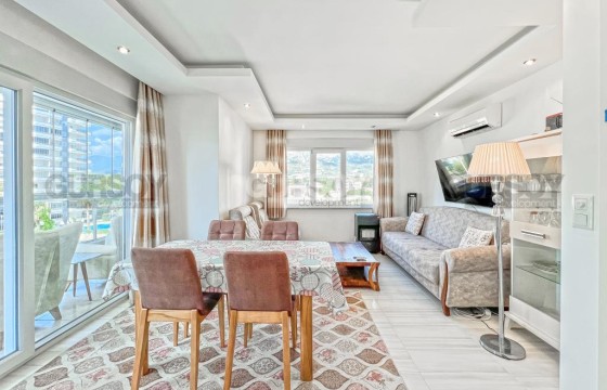 Небольшая уютная квартира с просторным застекленным балконом, в 450 метрах от моря в Турции - фото 6