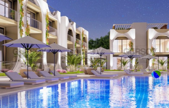 Квартиры с собственными террасами и садами в комплексе на этапе строительства в Гирне в Турции - фото 3