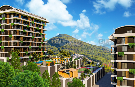 Комплекс отельного типа с квартирами 50-172 м2 в Демирташе. в Турции - фото 1