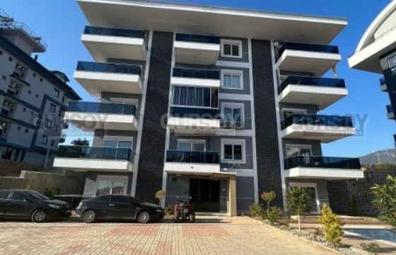 Небольшая квартира 1+1 в новом комплексе в районе Оба в Турции - фото 4