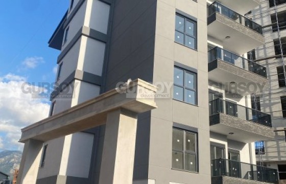 Двухкомнатная квартира по бюджетной цене в 300 метрах от моря, район Тосмур в Турции - фото 2