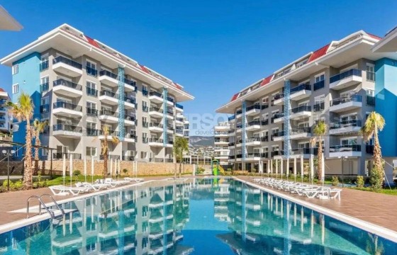 Просторная двухкомнатная квартира с видом на море в районе Кестель в Турции - фото 7