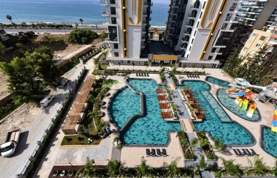 Шикарная квартира 2+1 на первой береговой линии в районе Махмутлар в Турции - фото 10