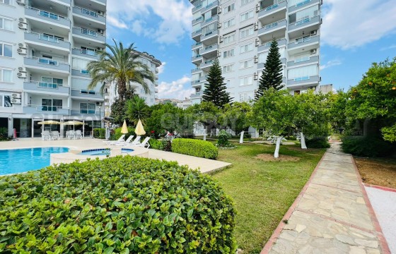 Ваш новый дом планировки 1+1 с видом на море в районе Джикджилли в Турции - фото 4