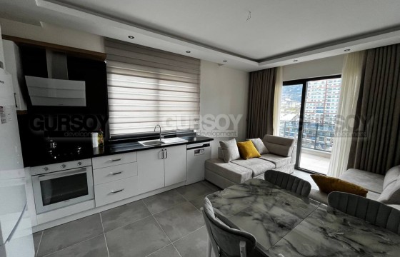 Квартира планировки 1+1 частично меблированная в новом комплексе район Махмутлар в Турции - фото 2