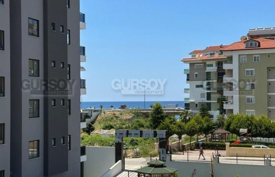 Новая квартира с видом на море в районе Кестель в Турции - фото 7