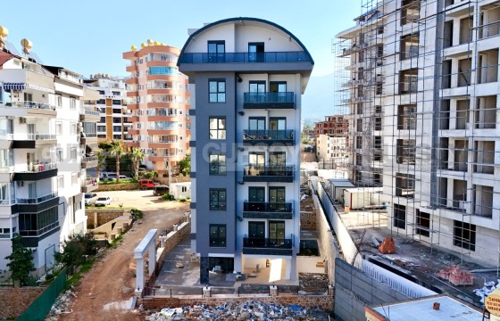 Двухкомнатная квартира в новом жилом комплексе района Тосмур в Турции - фото 6