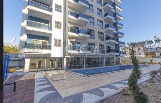 Просторные меблированные апартаменты 1+1 в Махмутларе в Турции - фото 12