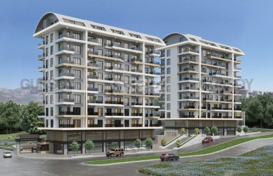 Шикарный строящийся комплекс с квартирами различных планировок в Махмутларе в Турции - фото 2