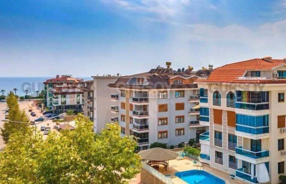 Двухкомнатная квартира у моря в районе Кестель в Турции - фото 5