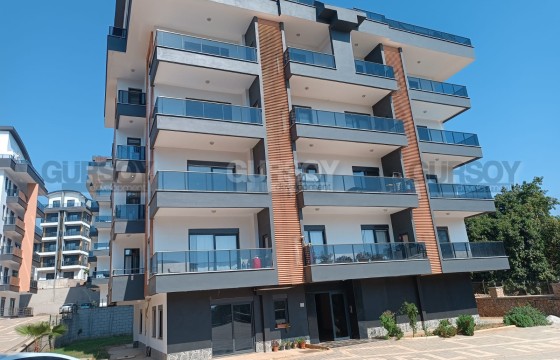 Новая четырехкомнатная квартира в районе Оба в Турции - фото 5