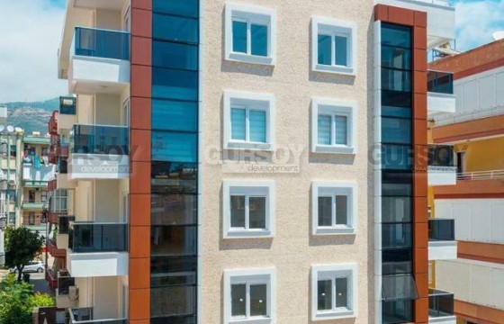 Квартира в удачной локации центра всего в 300 метрах от моря в Турции - фото 4