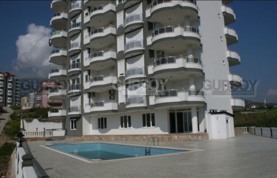 Просторная квартира 2+1 с двумя балконами и бассейном, всего в 700 м от пляжа в Турции - фото 10